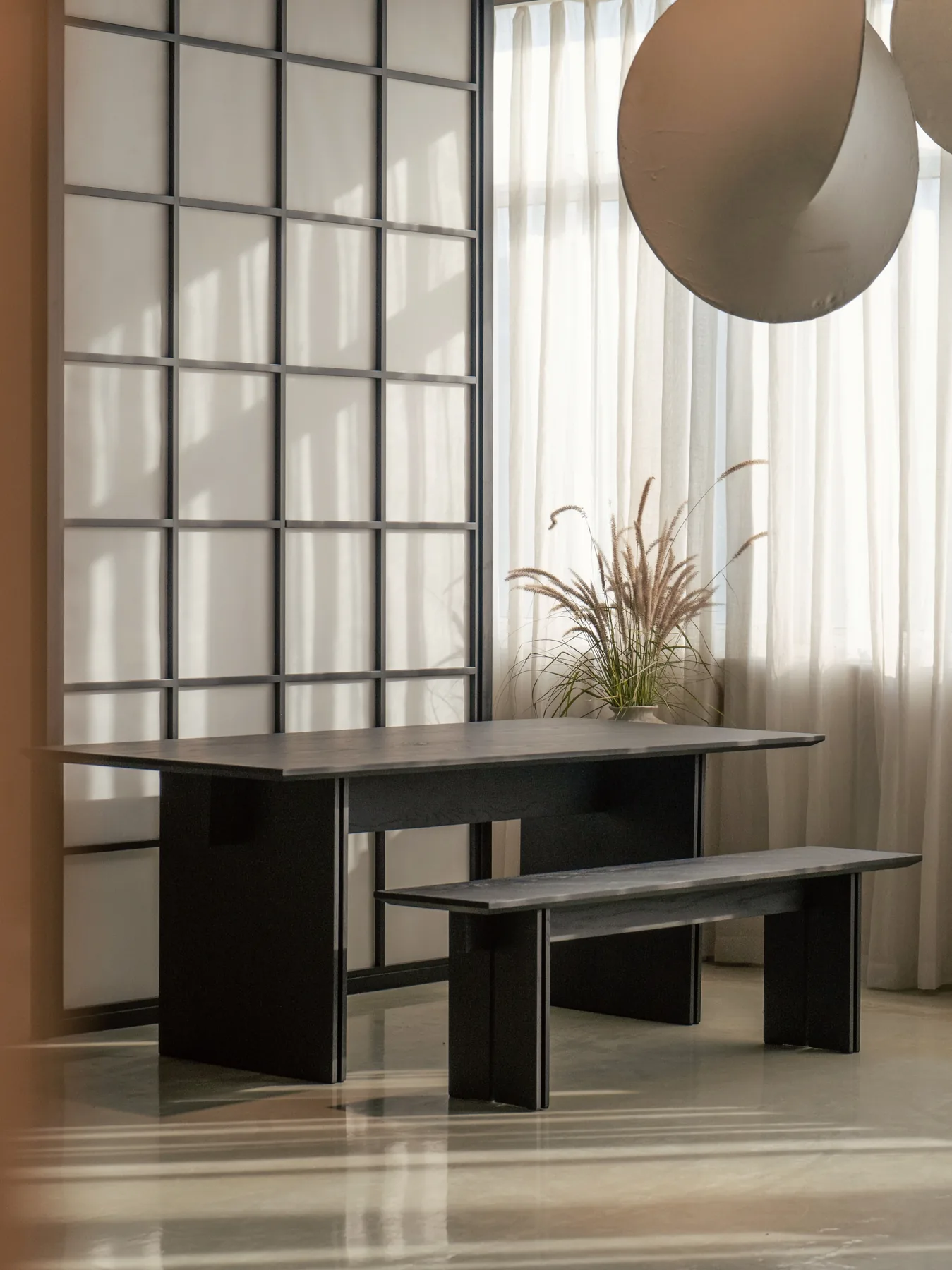 Guili dining table and bench in the showroom