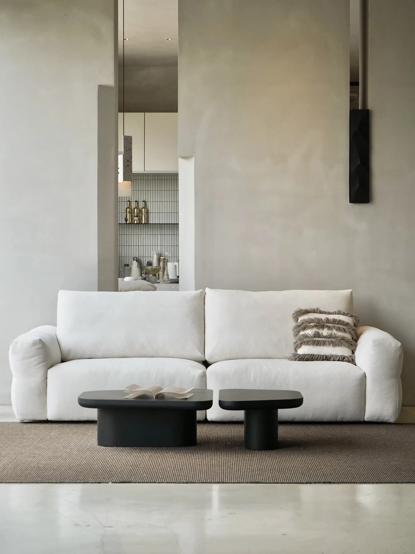 Featherweave sofa in a light-toned showroom