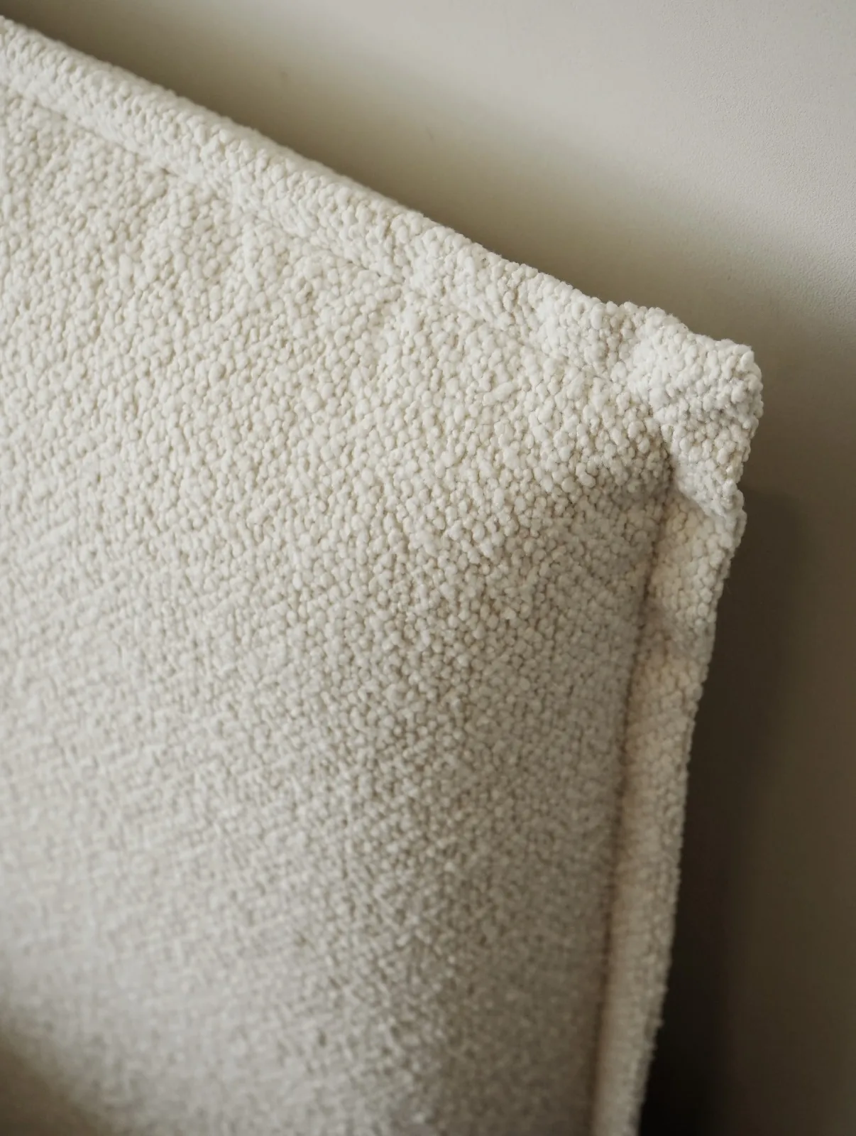 Detail of the upholstered bed frame